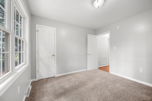 1279 Buck Creek Rd, Appomattox, VA 24522 - unfurnished bedroom with carpet and multiple windows
