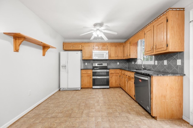 1279 Buck Creek Rd, Appomattox, VA 24522 - kitchen featuring stainless steel appliances, decorative backsplash, and a ceiling fan
