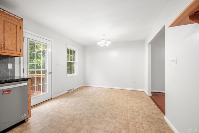 1279 Buck Creek Rd, Appomattox, VA 24522 - unfurnished dining area with a chandelier and baseboards
