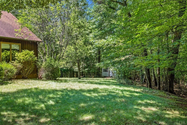 239 Briarcliff Ln, Madison Heights, VA 24572 - view of grassy yard featuring a wooded view