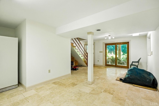 239 Briarcliff Ln, Madison Heights, VA 24572 - workout room with baseboards and light stone finish flooring