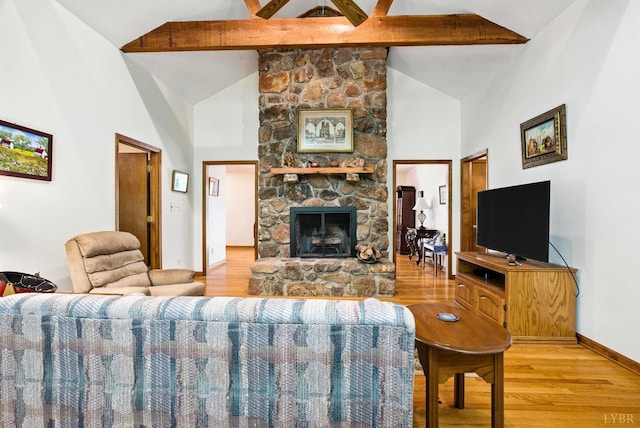 239 Briarcliff Ln, Madison Heights, VA 24572 - living room featuring beam ceiling, wood finished floors, a fireplace, and high vaulted ceiling