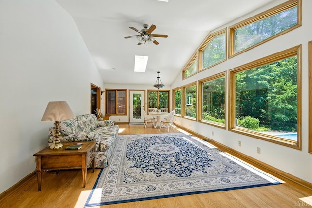 239 Briarcliff Ln, Madison Heights, VA 24572 - living area featuring a skylight, ceiling fan, wood finished floors, and high vaulted ceiling
