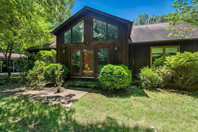 239 Briarcliff Ln, Madison Heights, VA 24572 - rear view of property featuring a yard and roof with shingles