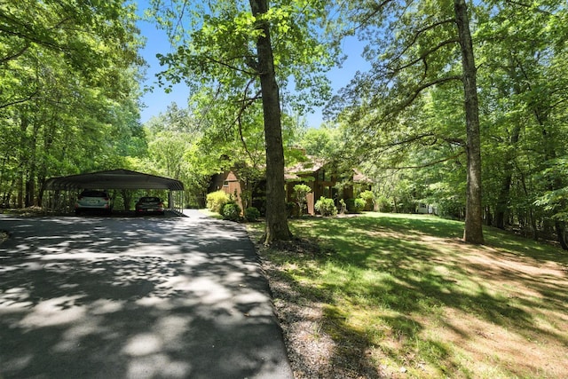 239 Briarcliff Ln, Madison Heights, VA 24572 - view of front of house with asphalt driveway, a carport, and a front lawn