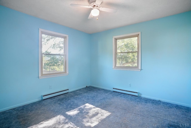 2294 High Peak Rd, Monroe, VA 24574 - carpeted empty room featuring a baseboard heating unit and ceiling fan