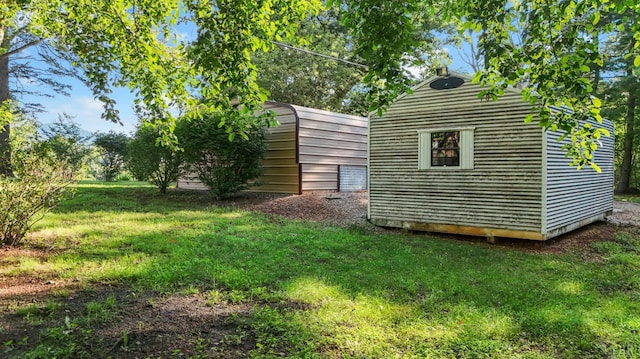 2294 High Peak Rd, Monroe, VA 24574 - view of green lawn featuring a storage shed