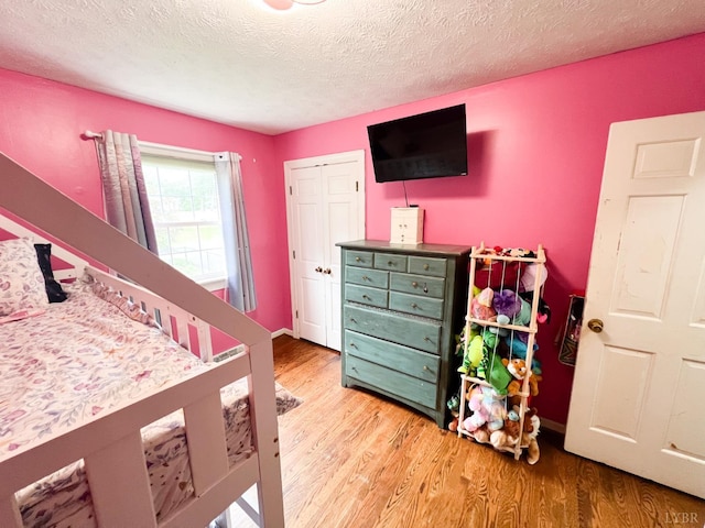 68 Cardwell Ln, Lynchburg, VA 24504 - bedroom featuring wood finished floors and a textured ceiling