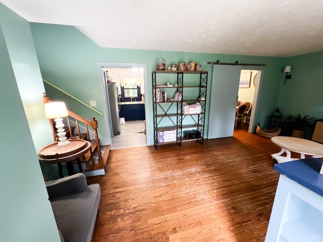 68 Cardwell Ln, Lynchburg, VA 24504 - living room with a barn door, wood finished floors, and stairway