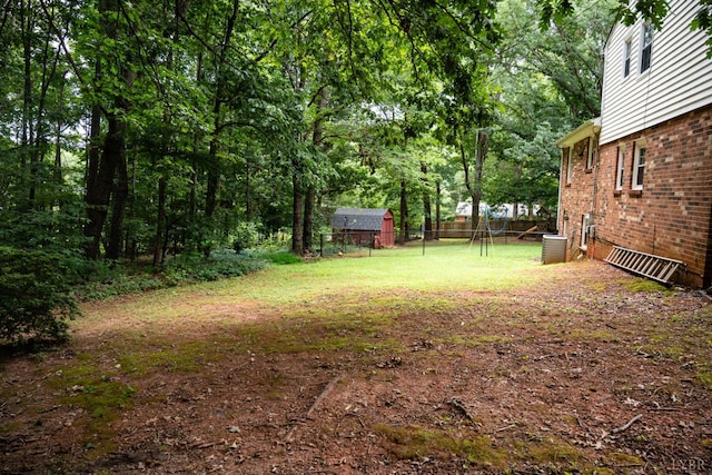 68 Cardwell Ln, Lynchburg, VA 24504 - view of yard featuring a storage unit