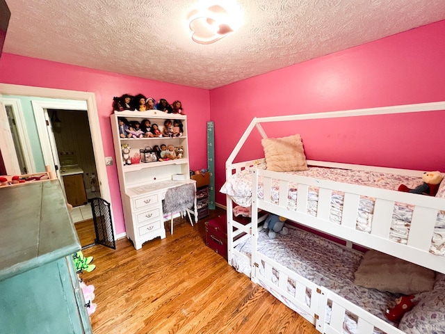 68 Cardwell Ln, Lynchburg, VA 24504 - bedroom with a textured ceiling and wood finished floors