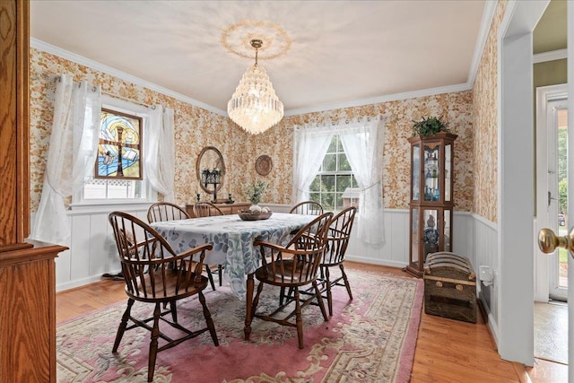 126 Arrowhead, Lynchburg, VA 24502 - dining room featuring wallpapered walls, ornamental molding, wainscoting, light wood-type flooring, and a chandelier
