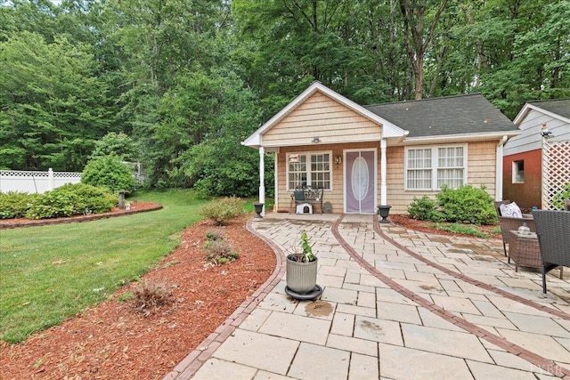 126 Arrowhead, Lynchburg, VA 24502 - view of front of house featuring a patio area and roof with shingles
