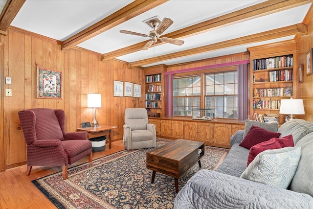 126 Arrowhead, Lynchburg, VA 24502 - living area with wooden walls, light wood-style floors, beam ceiling, and ceiling fan