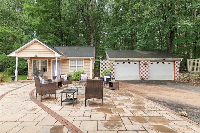 126 Arrowhead, Lynchburg, VA 24502 - view of patio with an outdoor structure, an outdoor living space, and a detached garage