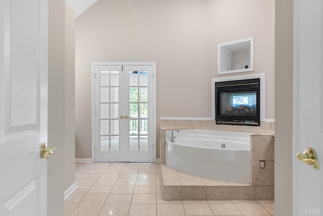 1505 Chestnut Grove Rd, Appomattox, VA 24522 - full bath featuring tile patterned floors, a garden tub, french doors, and high vaulted ceiling