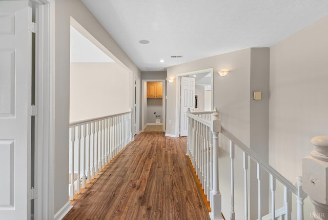 1505 Chestnut Grove Rd, Appomattox, VA 24522 - corridor with wood finished floors, an upstairs landing, and recessed lighting