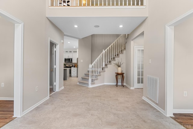 1505 Chestnut Grove Rd, Appomattox, VA 24522 - entryway with a high ceiling, stairway, and recessed lighting