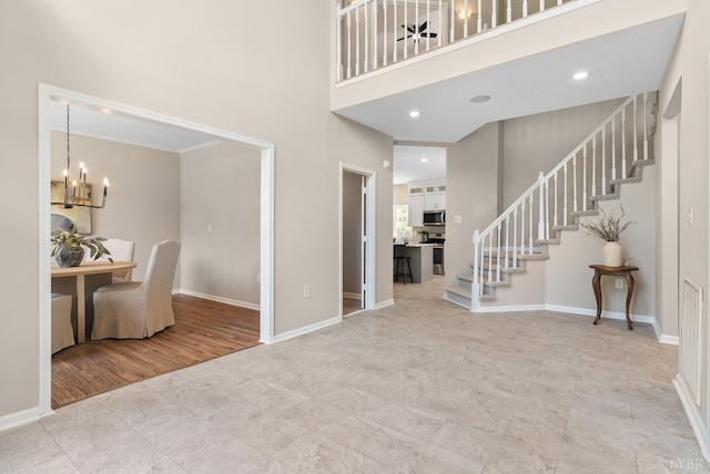 1505 Chestnut Grove Rd, Appomattox, VA 24522 - entrance foyer featuring stairs, a chandelier, and a high ceiling