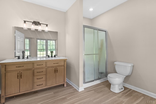 1505 Chestnut Grove Rd, Appomattox, VA 24522 - bathroom featuring wood finished floors, double vanity, and a shower stall