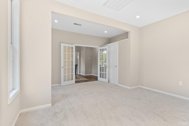 1505 Chestnut Grove Rd, Appomattox, VA 24522 - empty room featuring french doors, carpet floors, and recessed lighting
