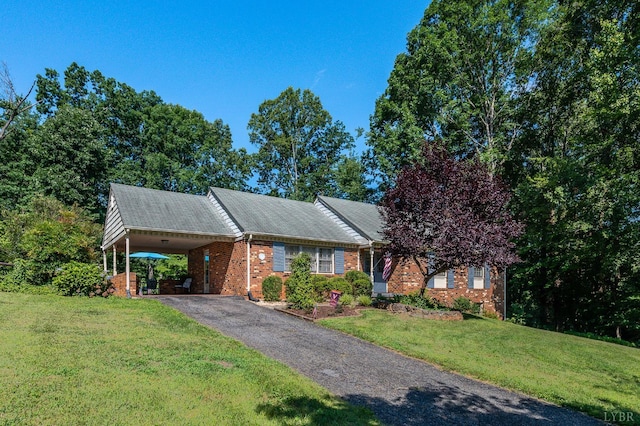 201 Windsor Rd, Lynchburg, VA 24502 - view of front of home featuring brick siding, a front yard, an attached carport, and driveway