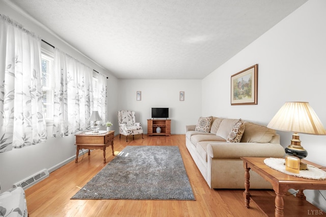 201 Windsor Rd, Lynchburg, VA 24502 - living area with a textured ceiling and wood finished floors