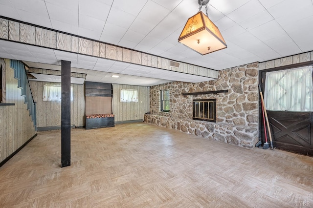 201 Windsor Rd, Lynchburg, VA 24502 - basement with a stone fireplace and wooden walls