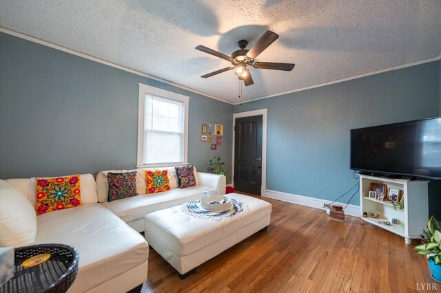 3040 Forest Hills Cir, Lynchburg, VA 24501 - living room featuring ornamental molding, a textured ceiling, a ceiling fan, and wood finished floors