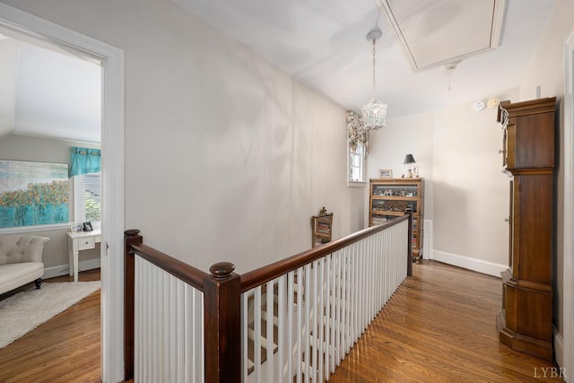 1517 Linden Ave, Lynchburg, VA 24503 - hallway with attic access, healthy amount of natural light, wood finished floors, an upstairs landing, and lofted ceiling