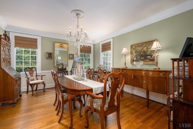 1517 Linden Ave, Lynchburg, VA 24503 - dining area with ornamental molding, a chandelier, and wood finished floors