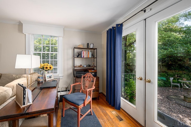1517 Linden Ave, Lynchburg, VA 24503 - sitting room featuring ornamental molding, light wood-type flooring, and plenty of natural light