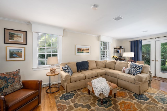 1517 Linden Ave, Lynchburg, VA 24503 - living area with crown molding, wood finished floors, healthy amount of natural light, and french doors
