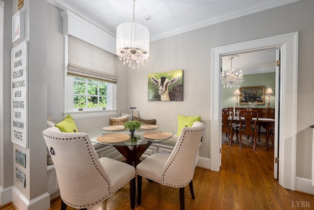 1517 Linden Ave, Lynchburg, VA 24503 - dining room featuring a chandelier, ornamental molding, and wood finished floors