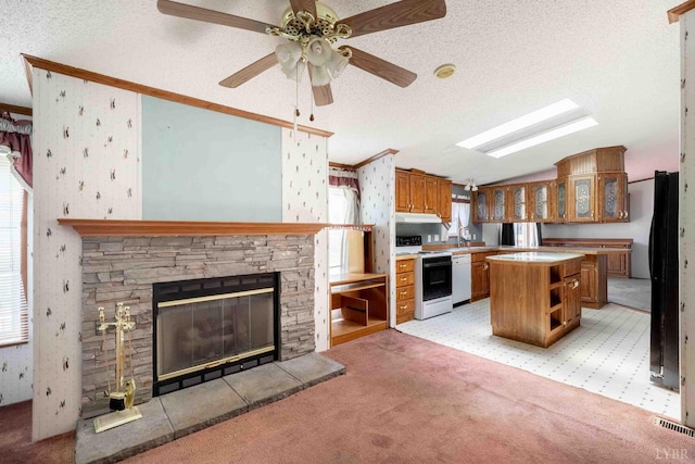 7026 Midway Rd, Phenix, VA 23959 - kitchen featuring white appliances, light colored carpet, brown cabinetry, a kitchen island, and open shelves
