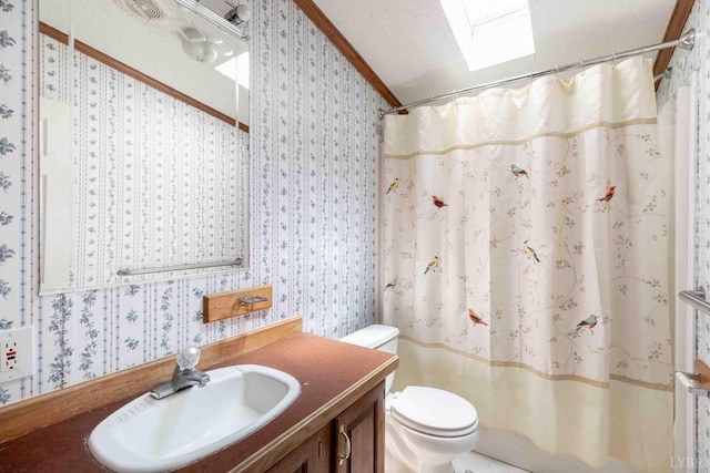7026 Midway Rd, Phenix, VA 23959 - bathroom with wallpapered walls, vanity, ornamental molding, vaulted ceiling, and a textured ceiling