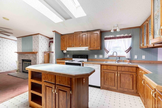 7026 Midway Rd, Phenix, VA 23959 - kitchen with white appliances, wallpapered walls, ornamental molding, under cabinet range hood, and light floors