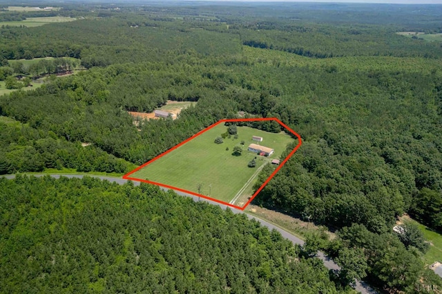 7026 Midway Rd, Phenix, VA 23959 - aerial view of property and surrounding area featuring a forest and property parcel outlined