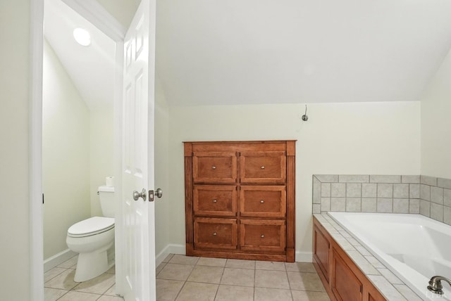 1433 Piney Mountain Rd, Appomattox, VA 24522 - bathroom with lofted ceiling, a garden tub, and tile patterned flooring