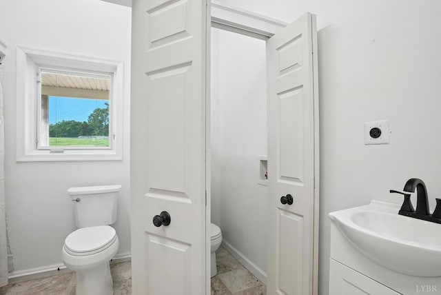 1433 Piney Mountain Rd, Appomattox, VA 24522 - bathroom with toilet and vanity