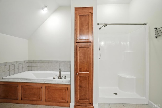 1433 Piney Mountain Rd, Appomattox, VA 24522 - bathroom with lofted ceiling, a bath, tile patterned flooring, and a shower