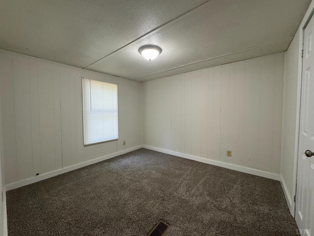 3687 Old Grist Mill Rd, Appomattox, VA 24522 - empty room featuring dark carpet and a textured ceiling