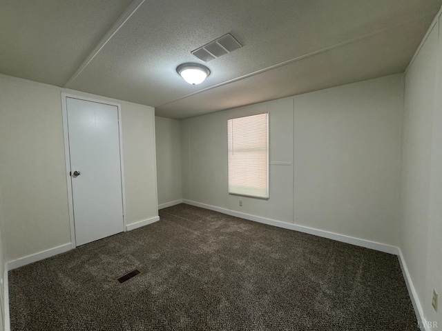 3687 Old Grist Mill Rd, Appomattox, VA 24522 - unfurnished room featuring dark colored carpet and a textured ceiling