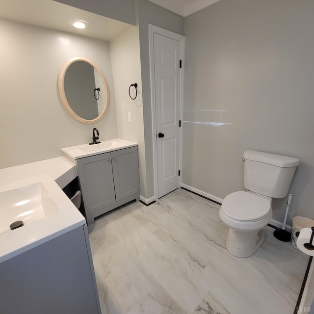 509 Meadowbrook Ln, Rustburg, VA 24588 - bathroom featuring two vanities and marble look tiles