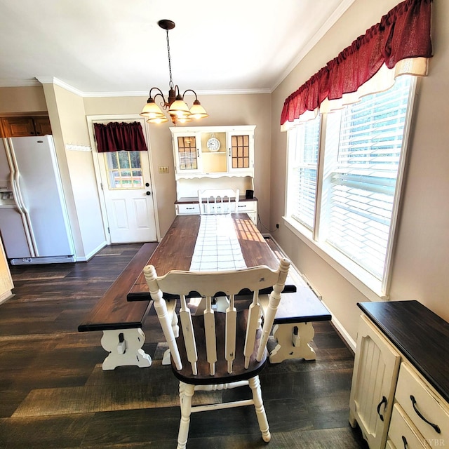 509 Meadowbrook Ln, Rustburg, VA 24588 - dining area with dark wood-style floors, a chandelier, and crown molding