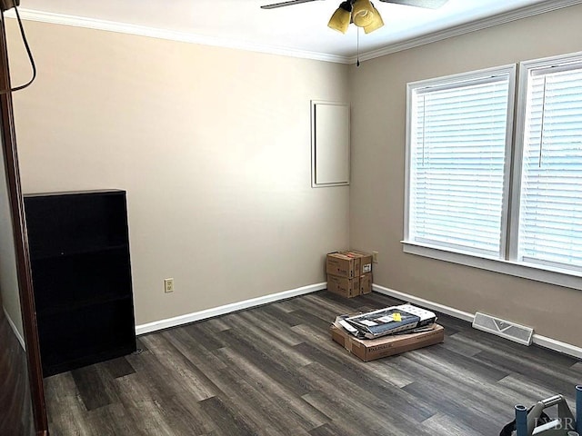 509 Meadowbrook Ln, Rustburg, VA 24588 - unfurnished room featuring dark wood-type flooring, ceiling fan, healthy amount of natural light, and crown molding