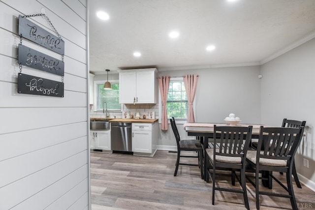 387 Stage Rd, Amherst, VA 24521 - kitchen featuring dishwasher, crown molding, recessed lighting, white cabinetry, and light wood-type flooring