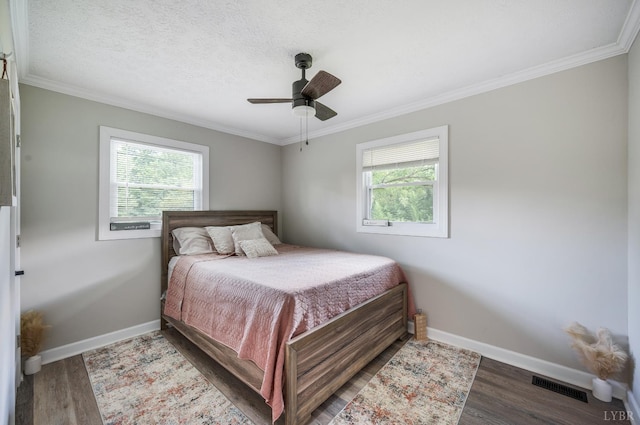 387 Stage Rd, Amherst, VA 24521 - bedroom with multiple windows, wood finished floors, crown molding, and ceiling fan