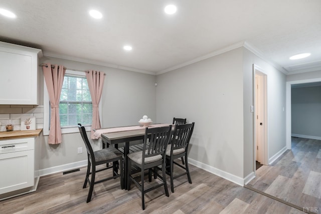 387 Stage Rd, Amherst, VA 24521 - dining area featuring ornamental molding, light wood finished floors, and recessed lighting