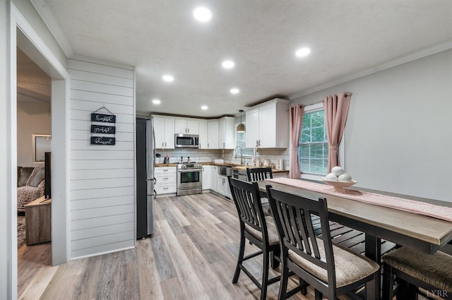 387 Stage Rd, Amherst, VA 24521 - dining area featuring ornamental molding, recessed lighting, and light wood-type flooring
